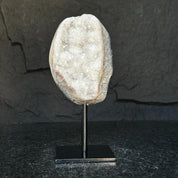 White quartz on stand, Geode with metallic base included for home decoration