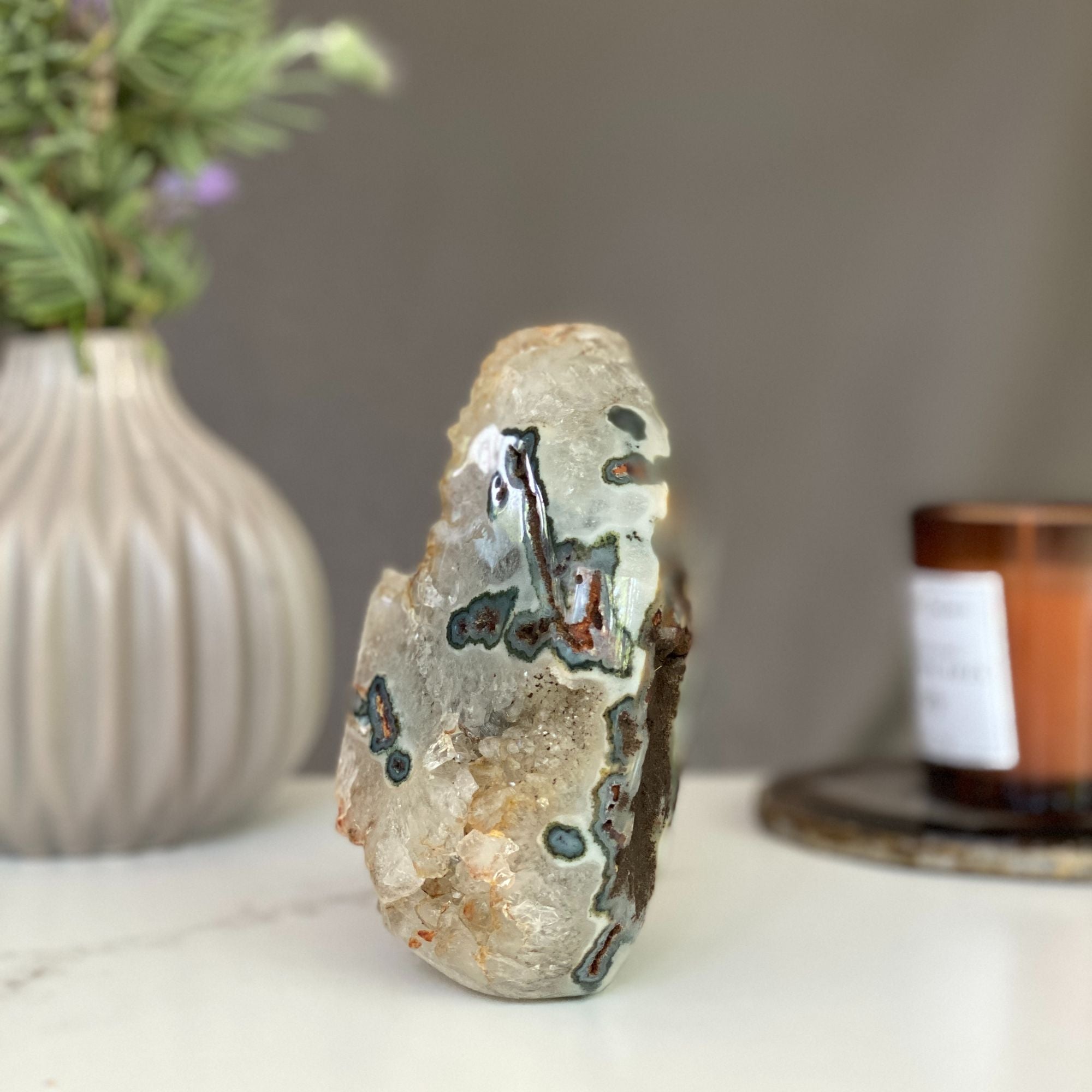 Agate flame decor with natural green and red crystals, polished edges, 5-inch height.