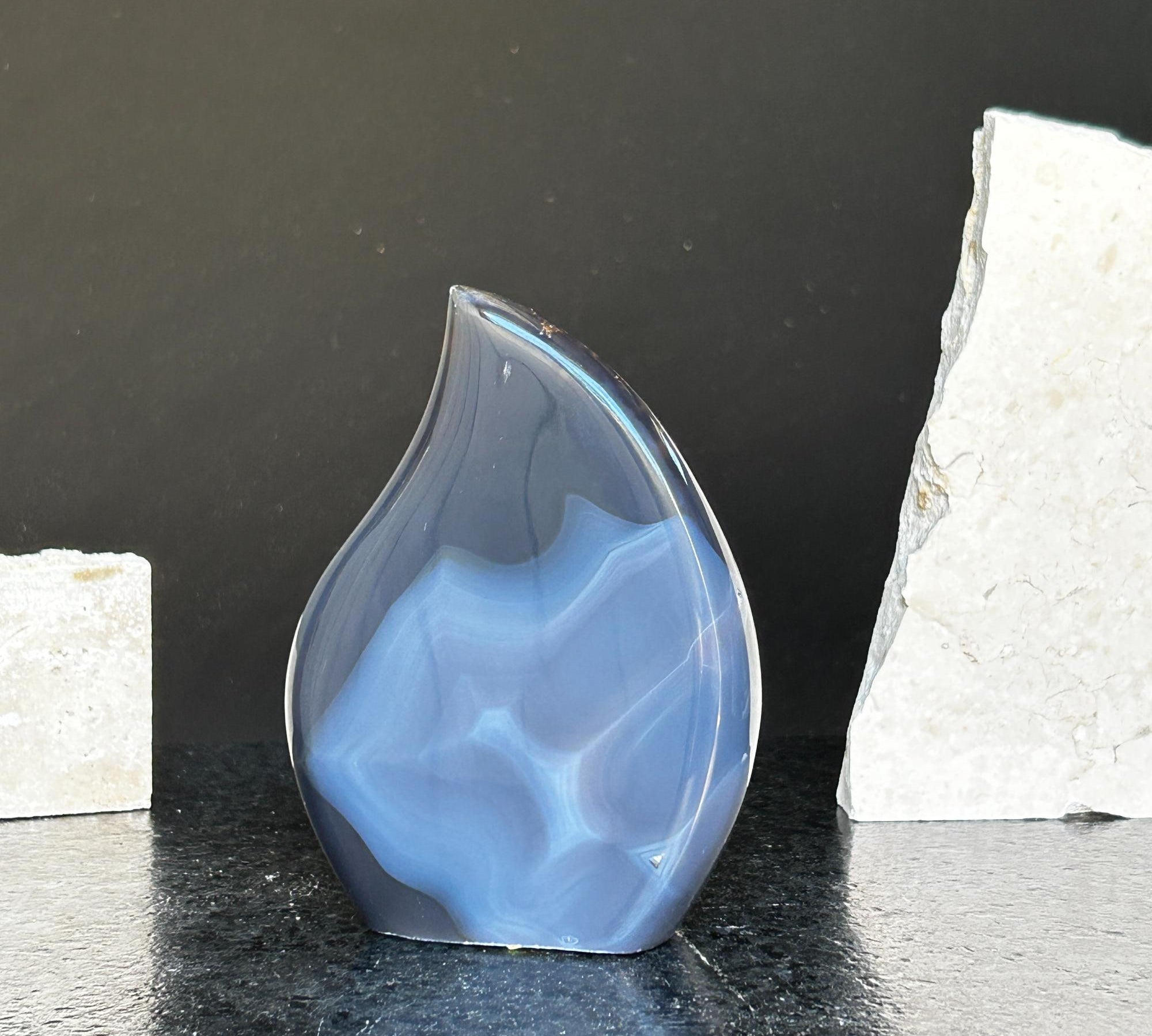 Polished blue agate and quartz flame crystal, 5-inch tall, with natural white and grey formations.