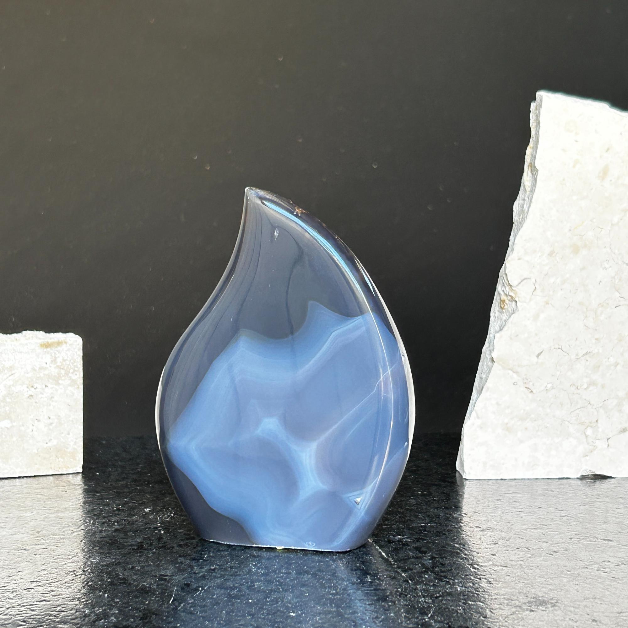 Polished blue agate and quartz flame crystal, 5-inch tall, with natural white and grey formations.