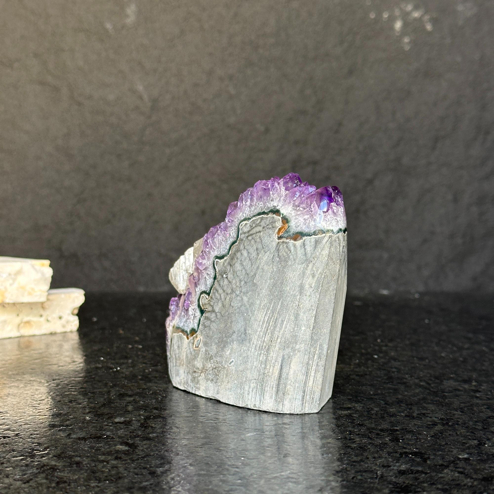 Rare amethyst crystal cathedral, 3.5-inch tall, with vibrant purple druzy and polished gray edges.