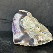 Extra large Uruguayan amethyst geode with deep purple crystals and incredible agate edges.