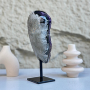 Self-standing amethyst geode, 8-inch tall, with sparkling purple crystals on a black metal stand.