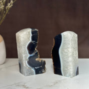 Pair of large, natural Uruguayan amethyst and agate geode bookends with deep purple crystals.