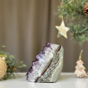 Deep purple Uruguayan amethyst cathedral geode, 3x3 inches, with a gray rock exterior.