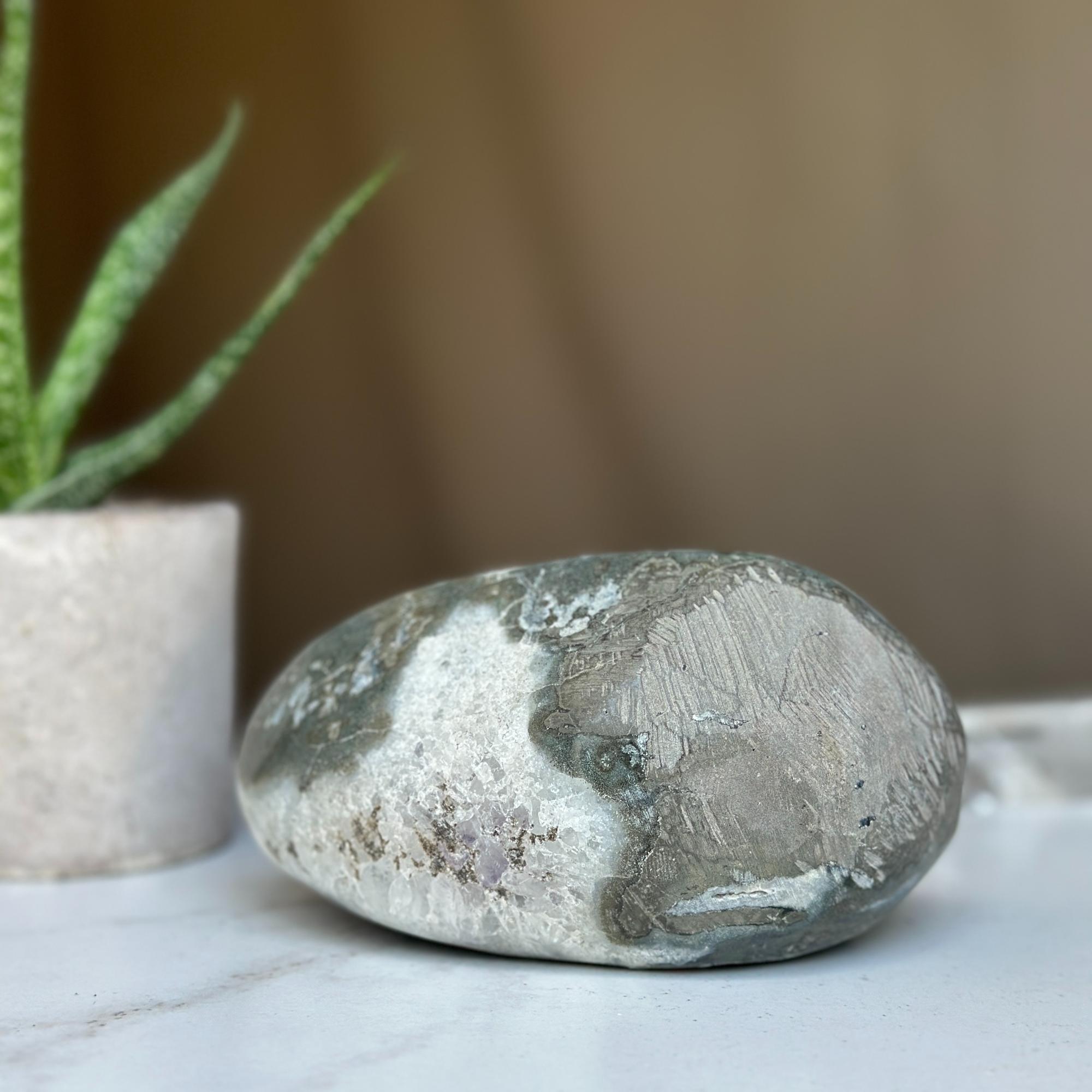 Polished amethyst geode cave with purple crystals and gray agate, 5.5x4 inches.