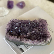 Vibrant deep purple Uruguayan amethyst crystal cluster geode, 3x4.3 inches, with sparkling points.