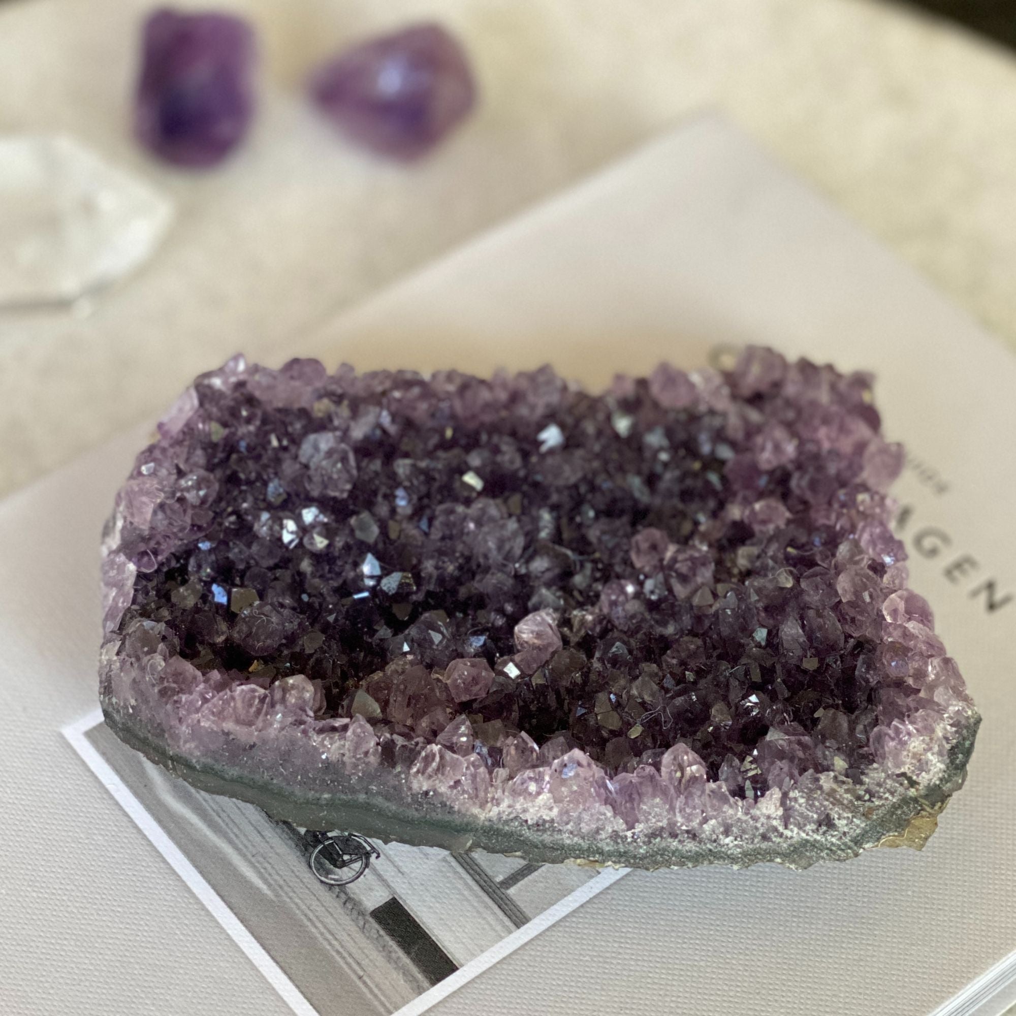 Vibrant deep purple Uruguayan amethyst crystal cluster geode, 3x4.3 inches, with sparkling points.