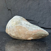 Rough, self-standing amethyst geode exterior, 7x4 inch, with natural grey and reddish-brown tones.