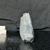 Uruguayan amethyst geode, cut base, with gray and green agate edges, self-standing.