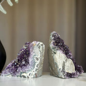 Two deep purple amethyst geodes with calcite formations, 5x3.5 inches, 3.9 lb set.