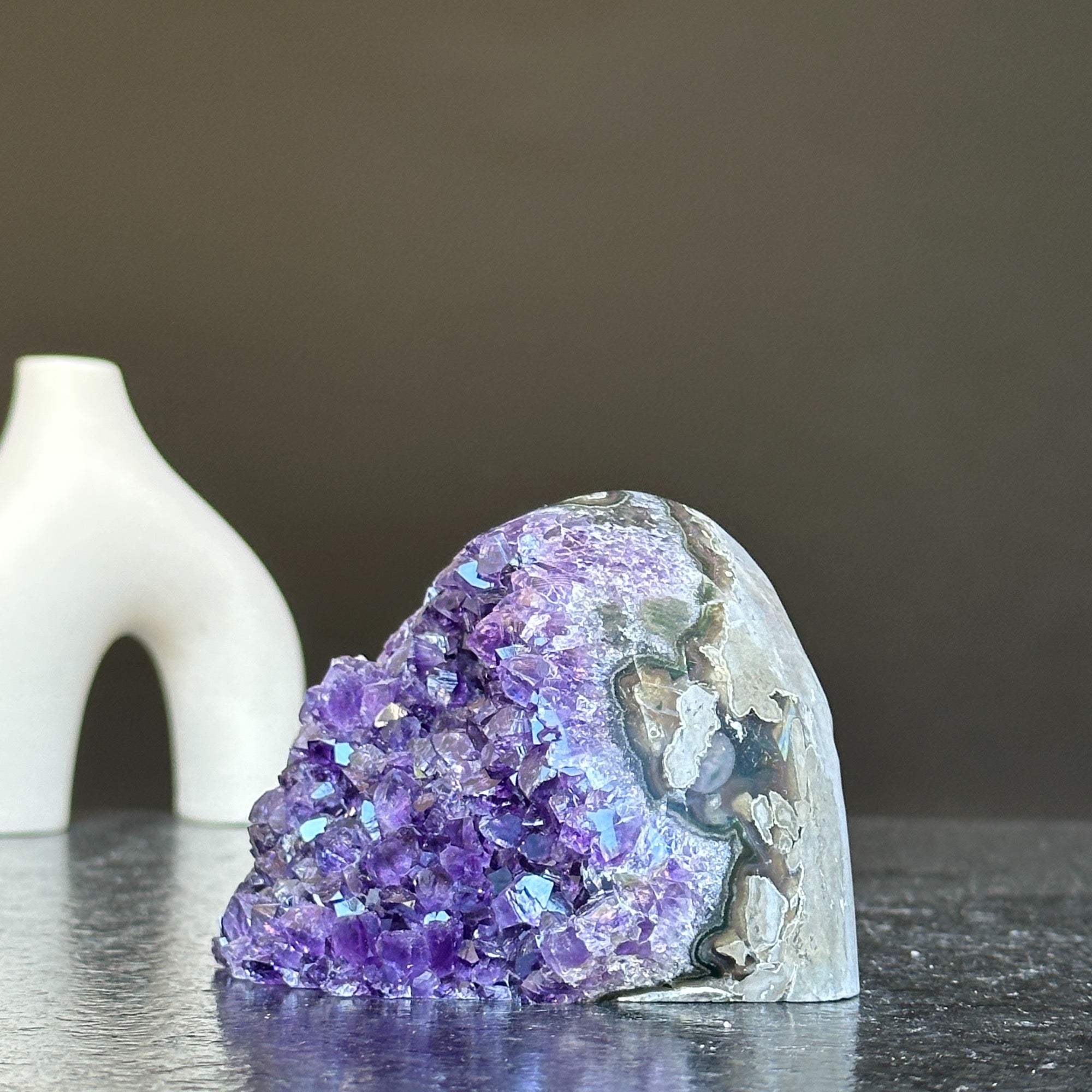 Self-standing cut base amethyst crystal cluster, 3x3 inches, with deep purple crystals and natural gray exterior.