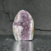 Extra large 5-inch tall amethyst cluster geode with sparkling deep purple crystals and natural grey rock.