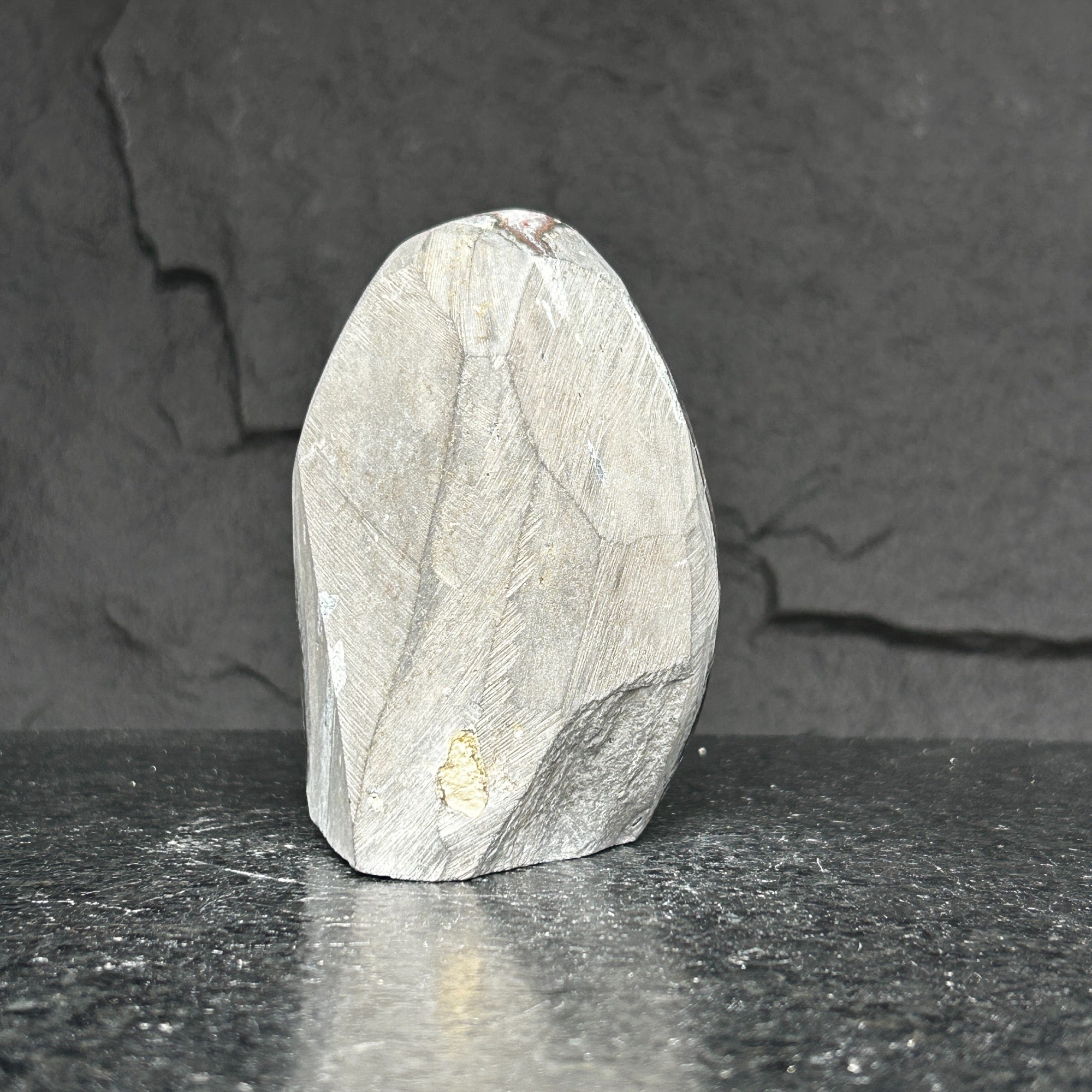 Extra large, rough light grey amethyst cluster with natural striations and unpolished surface.