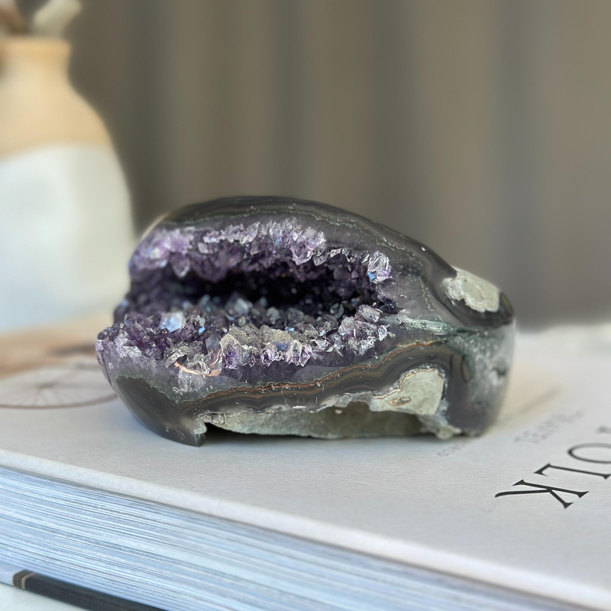 Amethyst cave geode crystal with agate layers