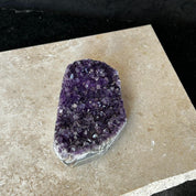 Flat amethyst raw purple crystal cluster