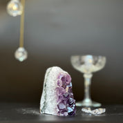 Purple Uruguayan Galaxy Amethyst geode, 3.5 inches tall, with sparkling crystals and a white outer layer.