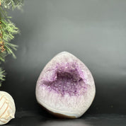 Polished deep purple amethyst geode egg, 5.5-inch tall, with crystal points and brown agate edges.