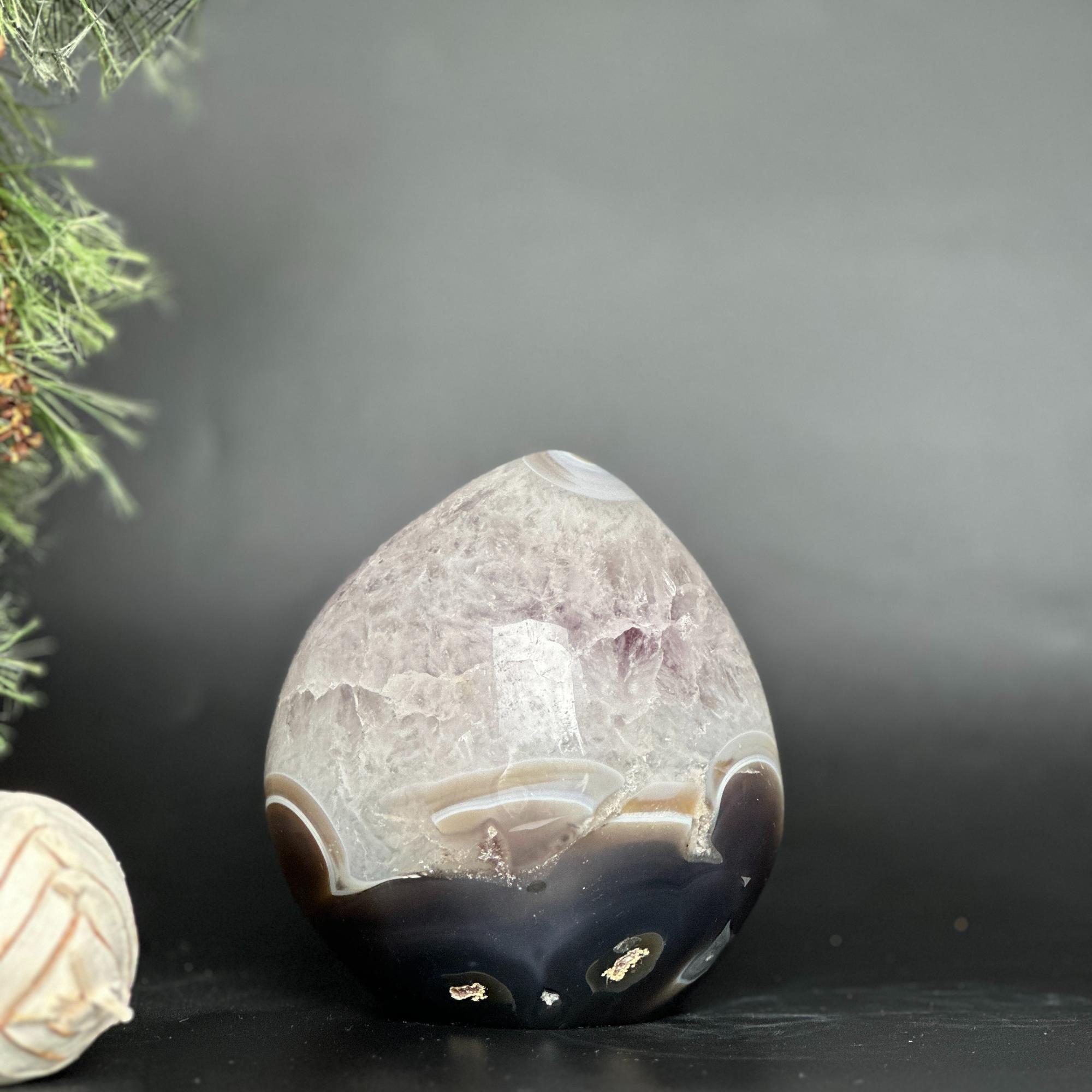 Polished deep purple amethyst egg crystal with brown agate formations, 5.5-inch tall.