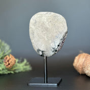Large, deep purple Uruguayan amethyst geode on a black metal stand, 7 inches tall.