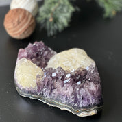 Large, deep-purple amethyst cluster with impressive crystal points and unique light yellow calcite formations.