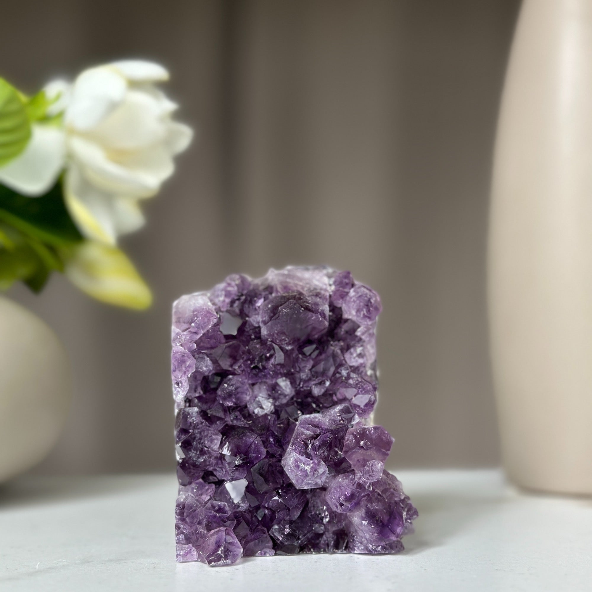 Uruguayan amethyst geode, 3.5-inch tall, 1.1 lb, with deep purple crystals.