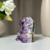 Uruguayan amethyst geode with deep purple crystals, 3.5 inches tall, 1.1 lb, for anxiety relief.