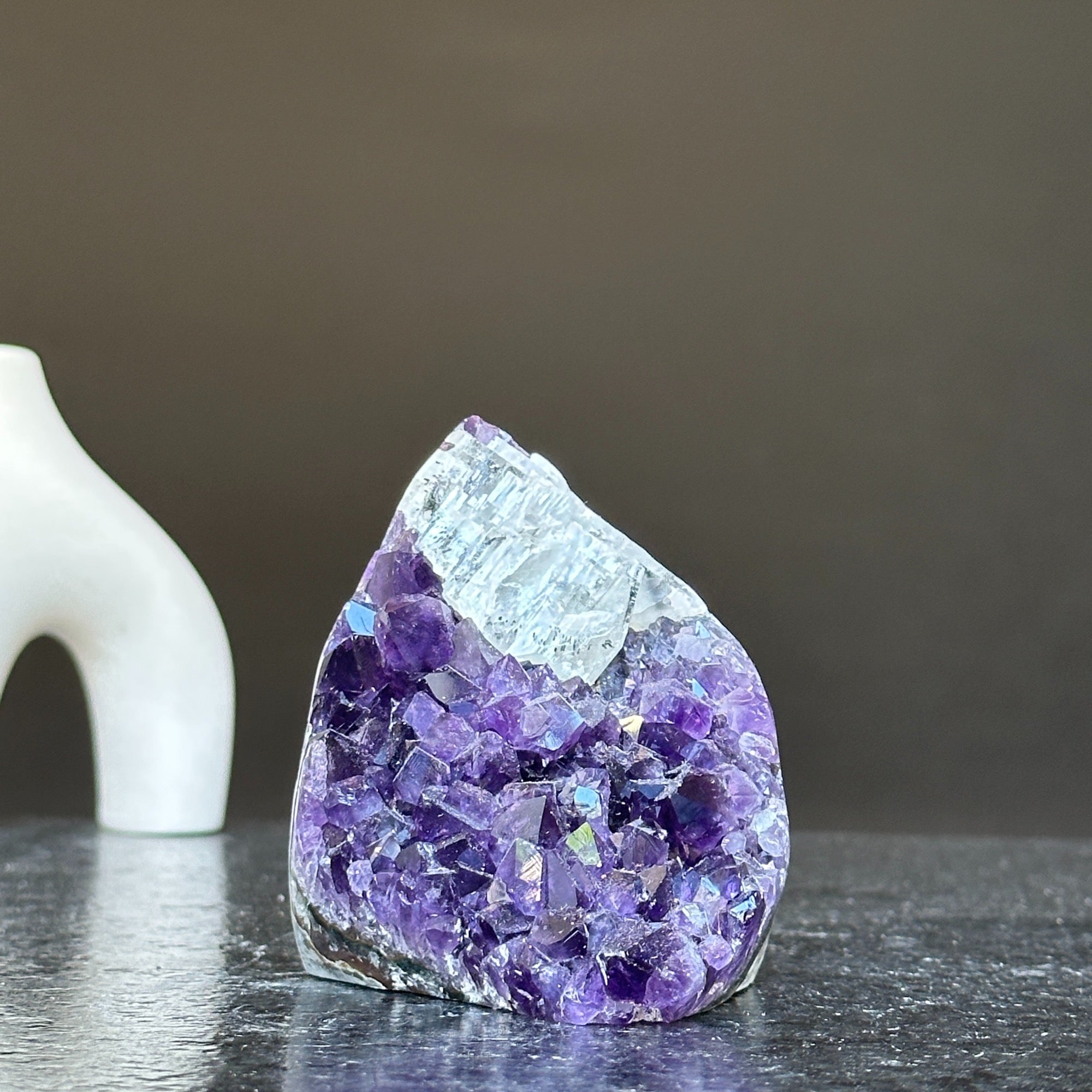 Natural deep purple Uruguay amethyst crystal geode, 3x3 inches, with sparkling facets.