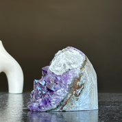 Deep purple Uruguay amethyst crystal geode, 3x3 inches, with raw stone exterior.
