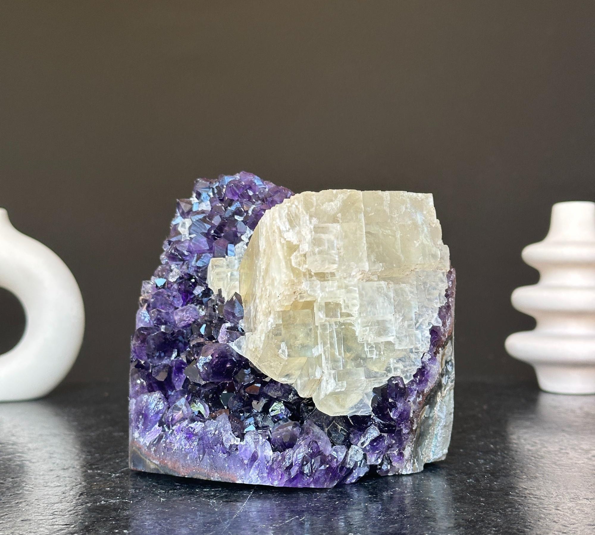 Vibrant deep purple amethyst geode cluster with a prominent creamy white crystal formation, 5.5 inches tall.