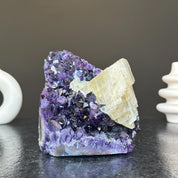 Top grade 5.5-inch tall amethyst geode featuring vibrant deep purple crystals and a prominent light yellow mineral.