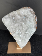 White quartz on stand, Geode with metallic base included for home decoration