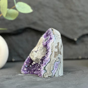 amethyst crystal with calcite