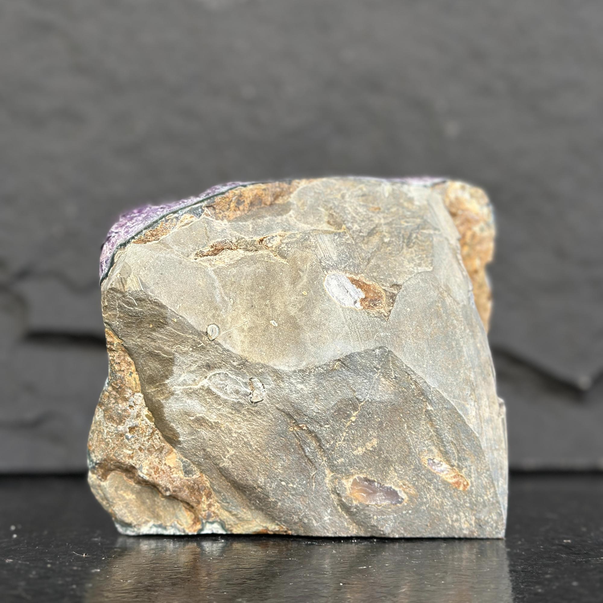 Mineral sample on a dark background