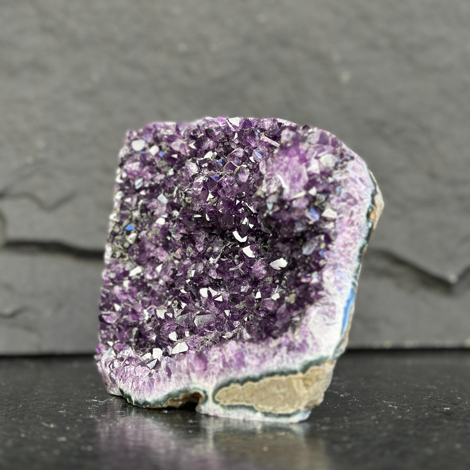 Amethyst crystal on a dark gray background