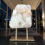 Crystal rock on a stand in a modern indoor setting