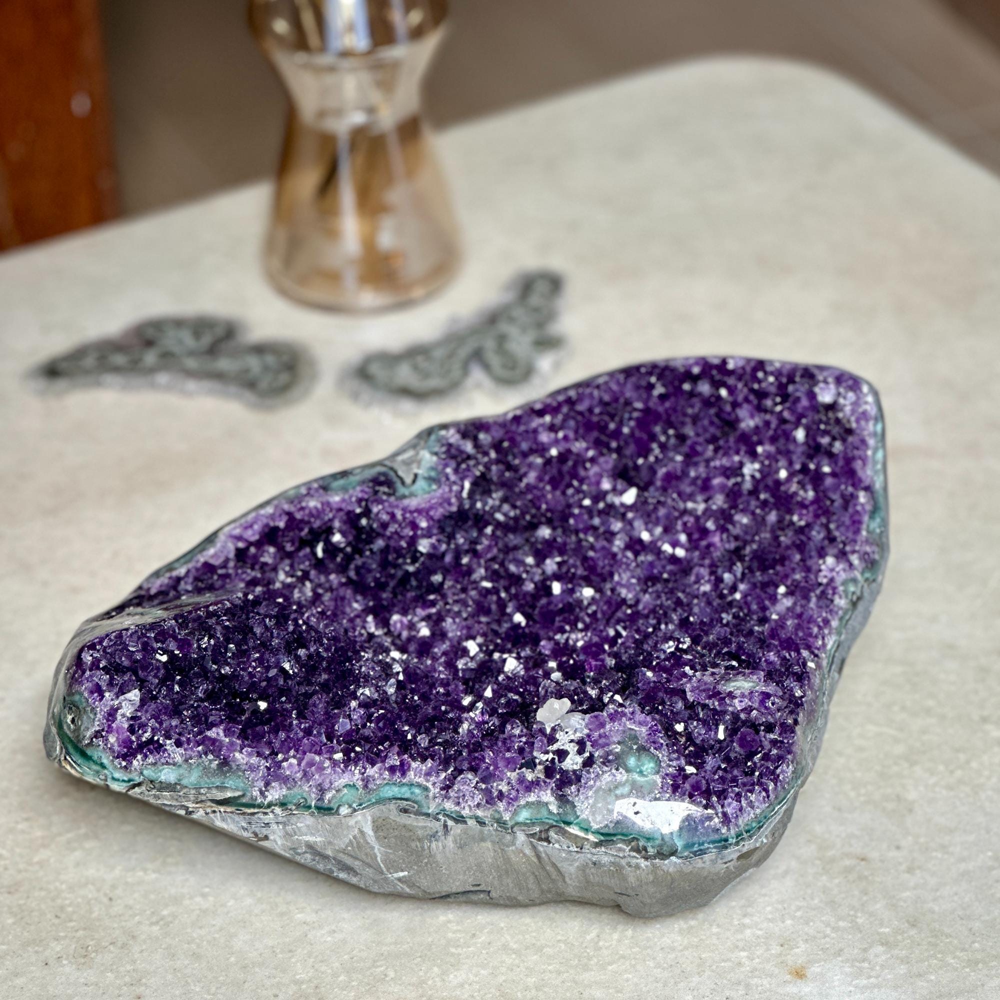 The largest Amethyst Geode Centerpiece, Extra Large decor piece, Outstanding Purple crystal with green agate details