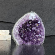 Amethyst stone agate edges, crystal geode from Uruguay, cut base self standing stone