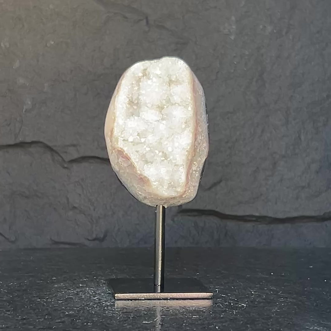 White quartz on stand, Geode with metallic base included for home decoration