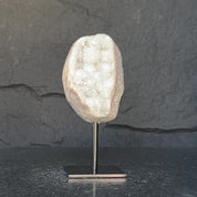 White quartz on stand, Geode with metallic base included for home decoration