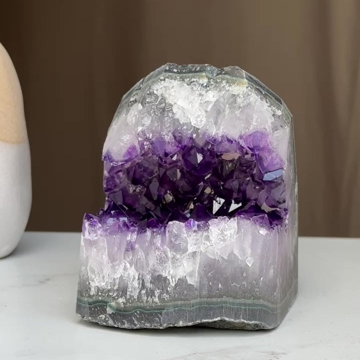 Amethyst cave geode crystal with agate layers