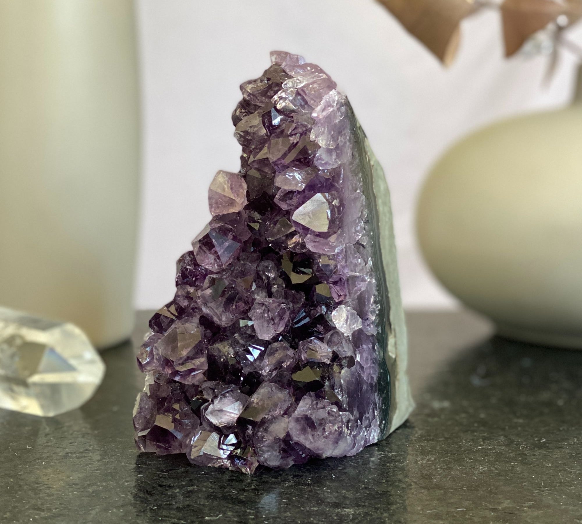 Large raw amethyst geode cluster with vibrant deep purple crystals, 4.5 inches tall.