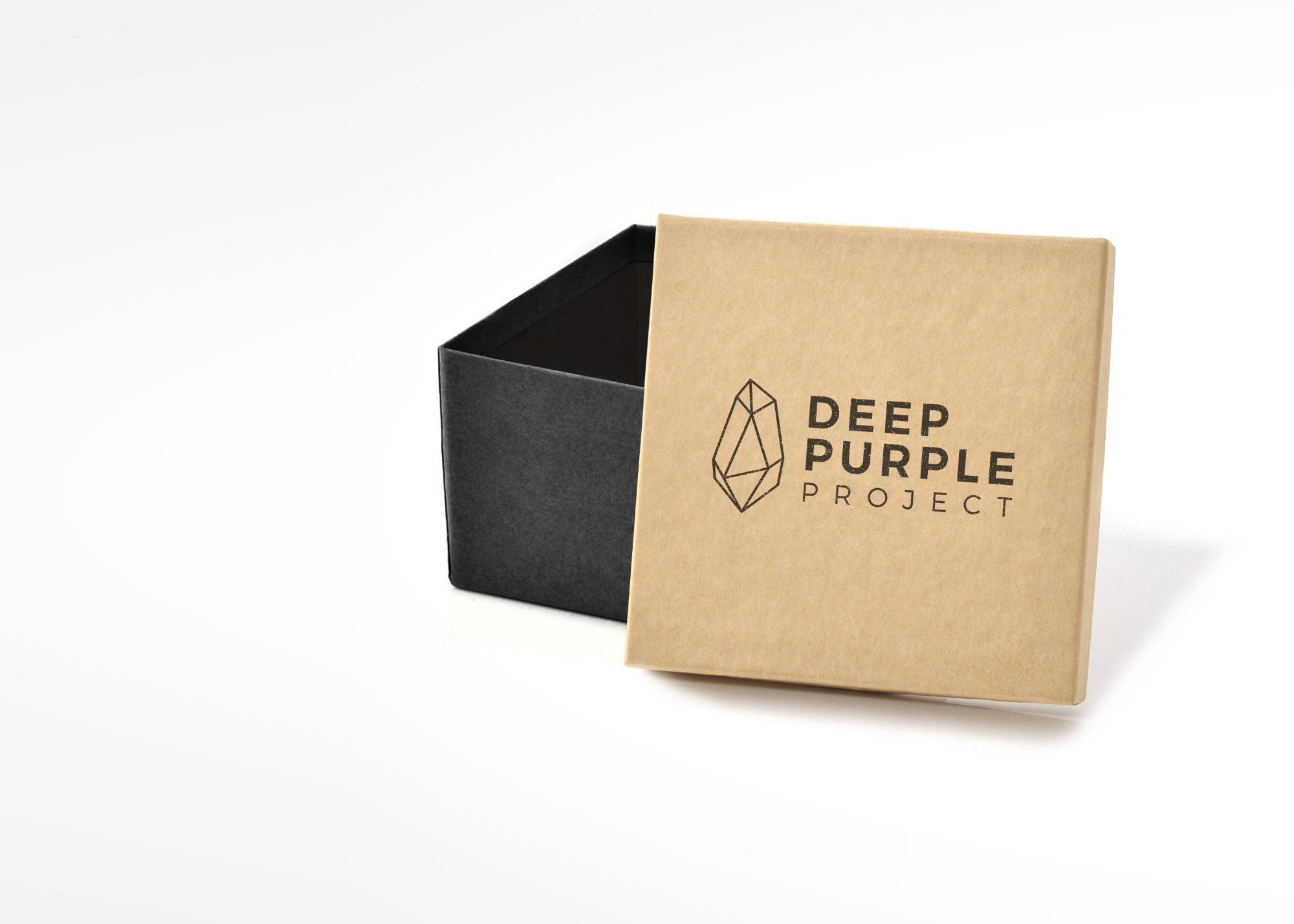 Deep Purple Project kraft gift box packaging for amethyst geode, with black base and logo.